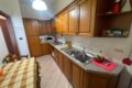 cucina angolare in legno